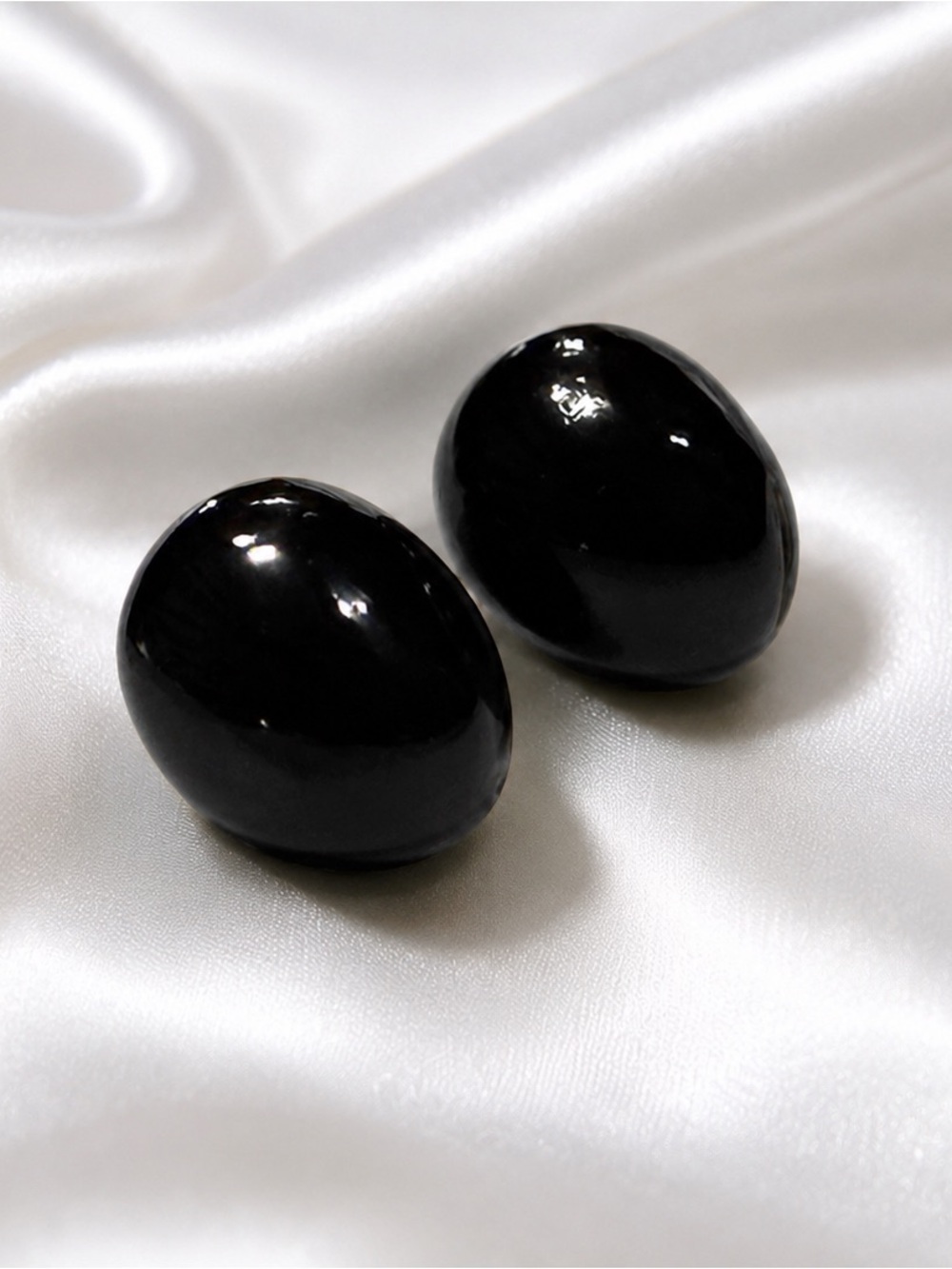 Black coral stud earrings